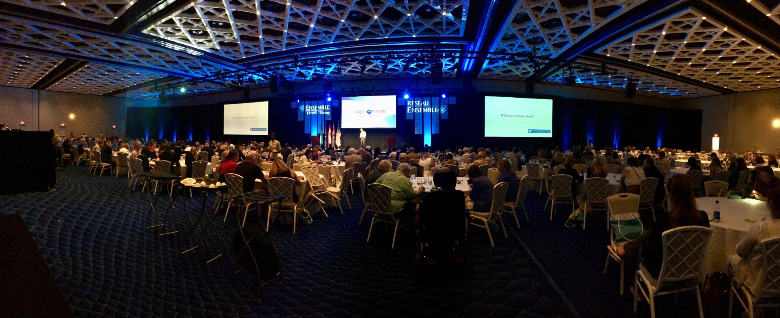 Eric Papp speaking to a packed conference ballroom